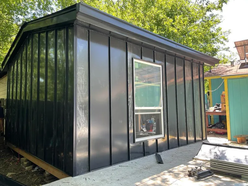 Black standing seam metal wall panels for Roof Inspection in Bristol